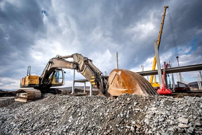 heavy-duty-industrial-excavator-loading-gravel-on-2021-08-26-15-28-00-utc.jpg